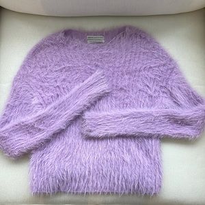 Purple fuzzy material sweater